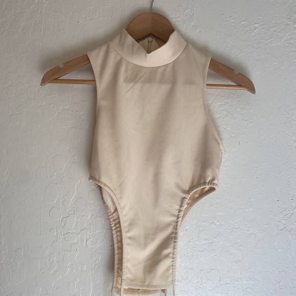 Zara Tops - Small Zara Nude/Beige High Neck top with front and back string detail RUNS SMALL
